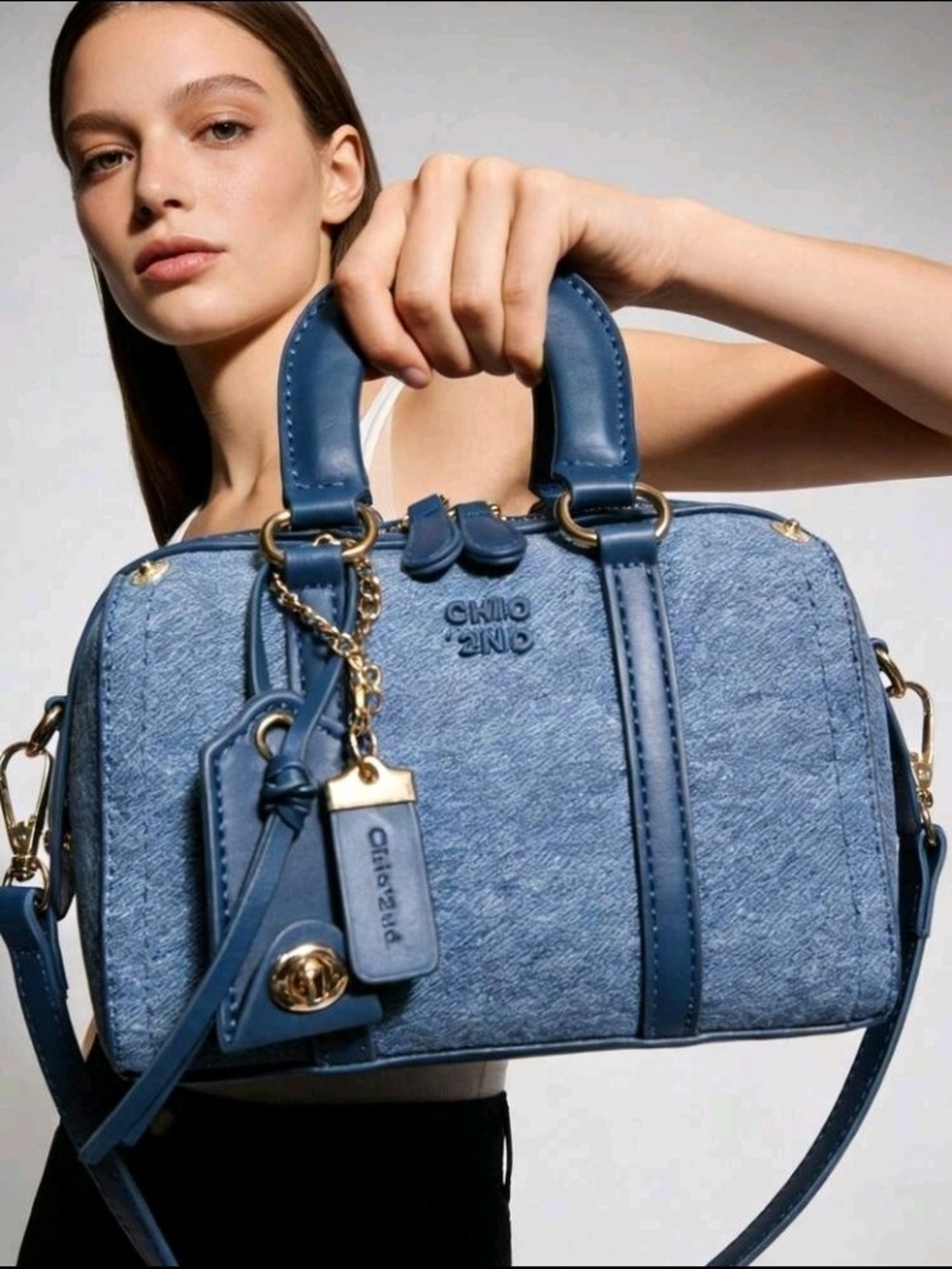Chio Zno Denim-Textured Blue Satchel with Gold Hardware